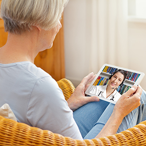 Big Bend patient using TeleHealth to connect with her provider.